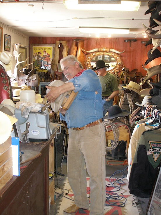 Randy Rodriquez, owner Rio Bravo Trading Company blocking Thom Valenza's hat<br>www.riobravotradingcompany.com