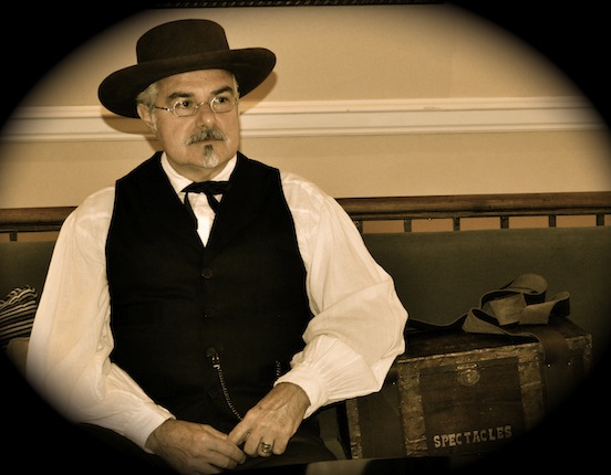 Thom Valenza , portraying spectacle peddler, George Washington Hotel, Winchester, Va., 2012<br>